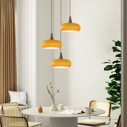 Amber Glass Pendant Light Oblate Disc Wood Top Close Up
