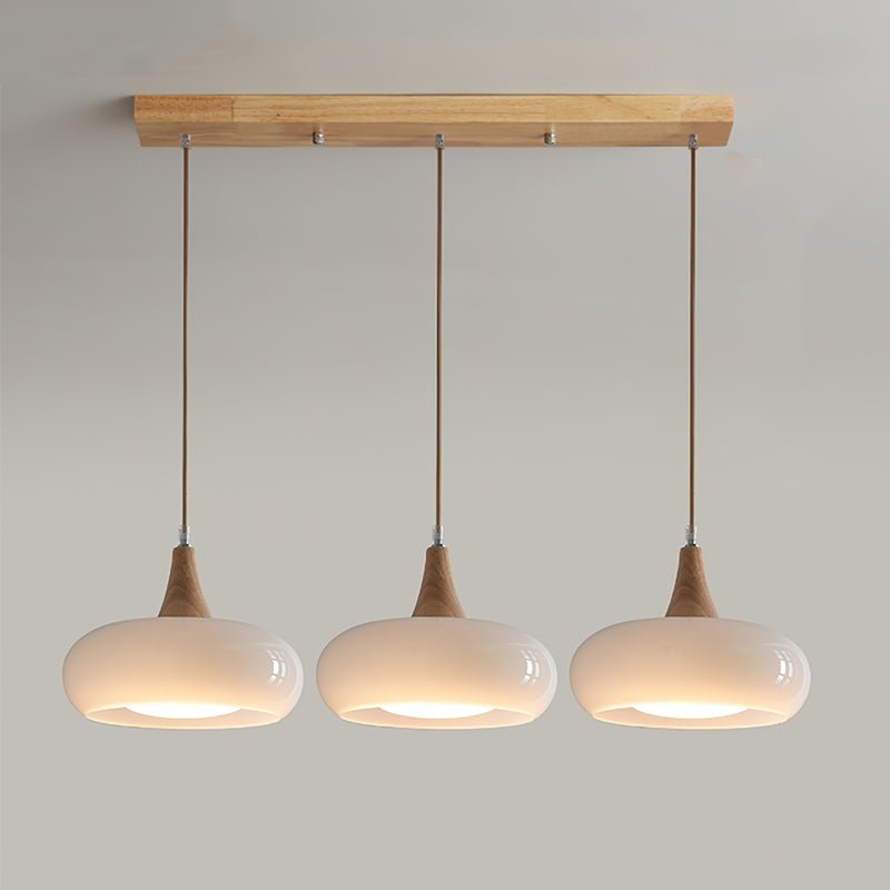 Amber Glass Pendant Light Oblate Disc Wood Top Lifestyle