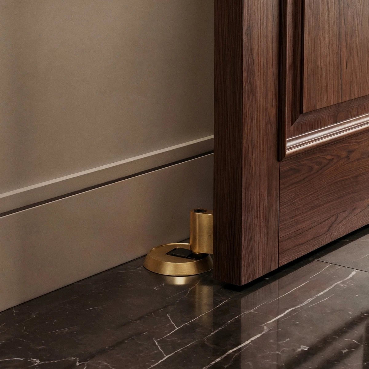 Modern Brass Door Stop Offset Cylinder Post Lifestyle