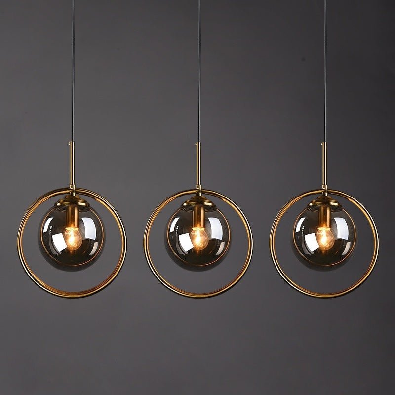 Zoey Glass Pendant Light with a Metal Ring Detail